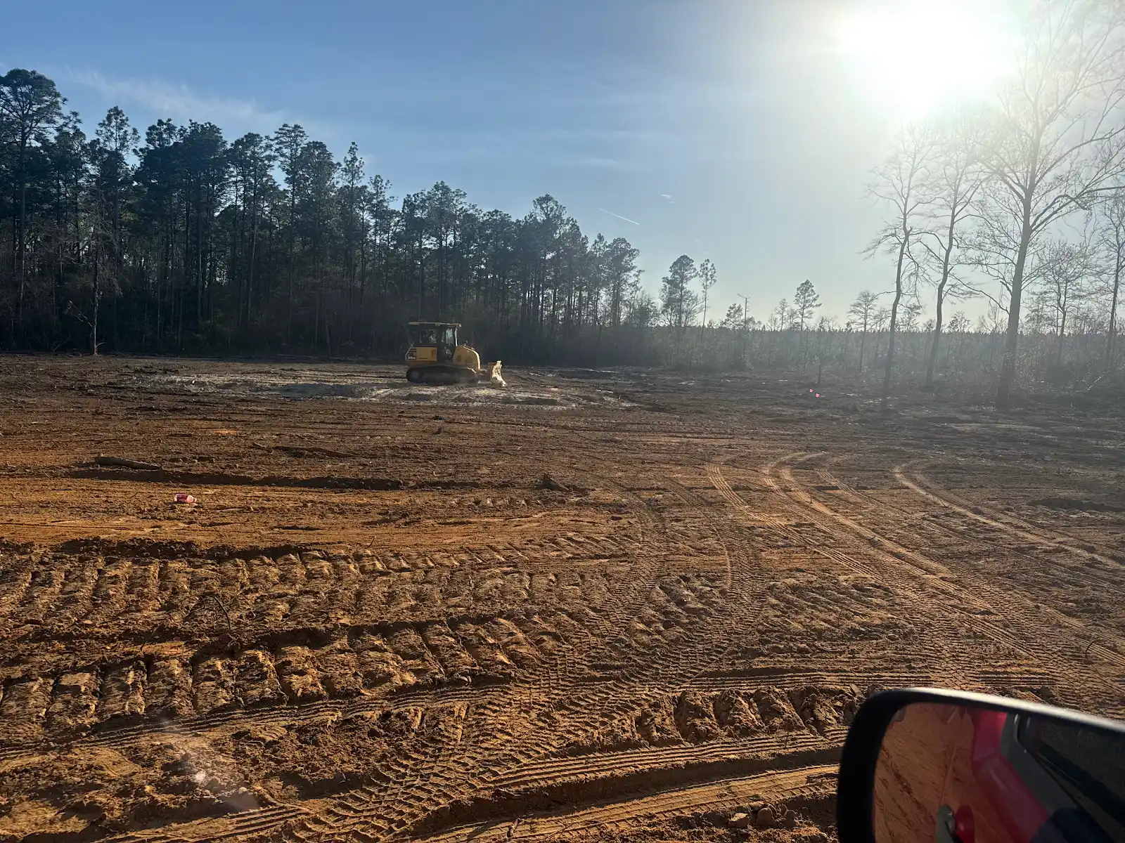 Bulldozer grading a cleared site